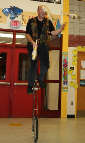 Clubs on Tall Unicyle (no fire)